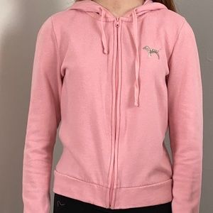 A pink zip up hoodie